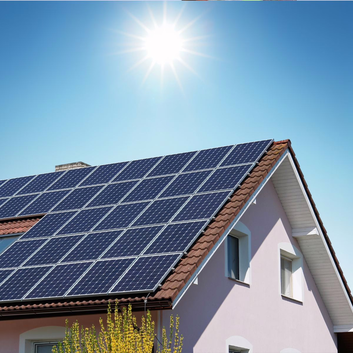 Experts with Triumph Roofing installing solar tiles and panels on customers property. 